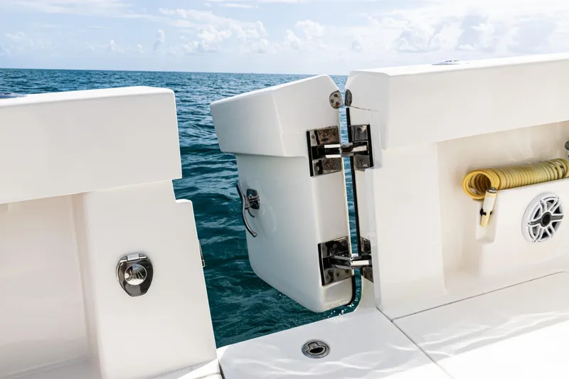 Slide: The Image of SeaVee 370z 2022 boat with open transom door, ocean view in background. - 19