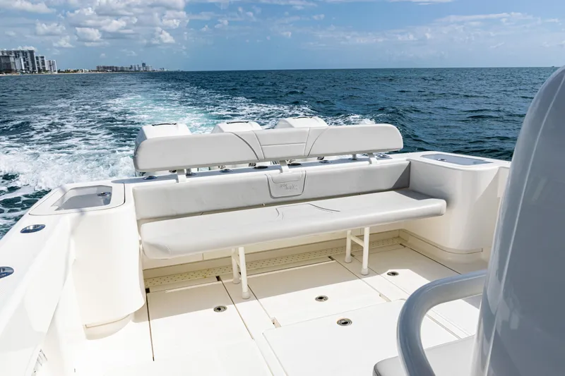 Slide: The Image of 2022 SeaVee 370z boat, rear seating view, cruising on open ocean. - 26