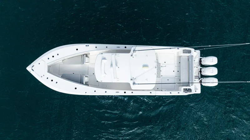 Slide: The Image of Aerial view of 2022 SeaVee 370z boat on deep blue water. - 27