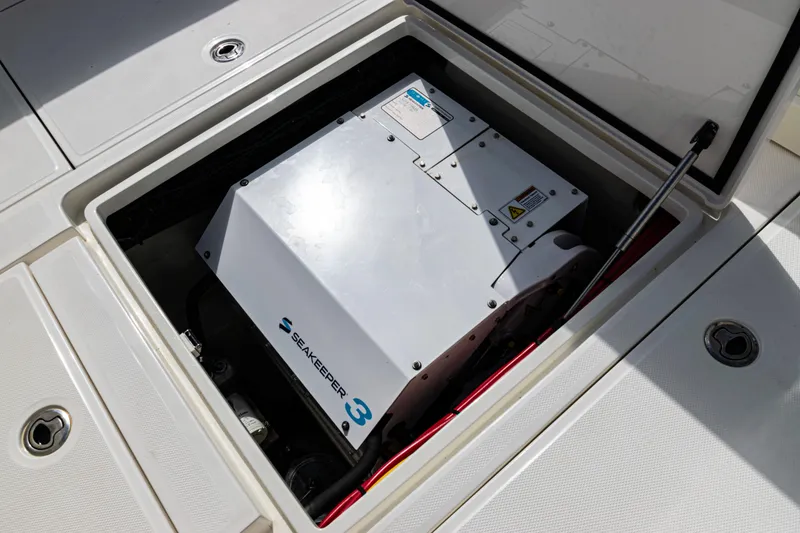 Slide: The Image of Seakeeper 3 stabilizer installed in a 2022 SeaVee 370z boat compartment. - 46
