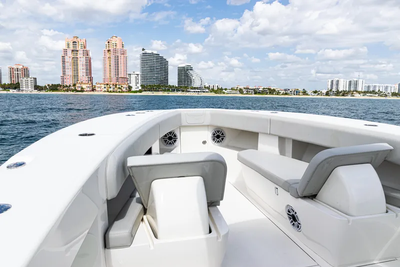 Slide: The Image of 2022 SeaVee 370z boat interior with city skyline in the background. - 6