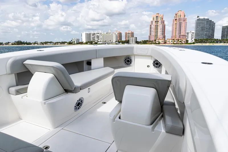Slide: The Image of 2022 SeaVee 370z boat interior with city skyline in background. - 8