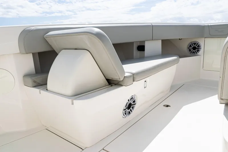 Slide: The Image of 2022 SeaVee 370z boat interior with cushioned seating and built-in speakers. - 9