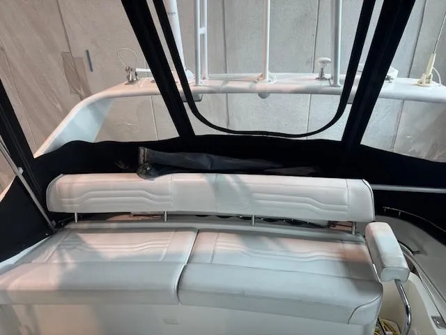 Slide: The Image of 2003 Carver 360 Sport Sedan interior with white seating and black trim. - 11