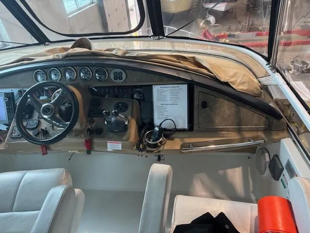 Slide: The Image of Interior cockpit of 2003 Carver 360 Sport Sedan with steering wheel and instrument panel. - 15