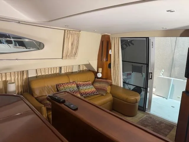 Slide: The Image of Interior of 2003 Carver 360 Sport Sedan with leather seating and modern decor. - 24