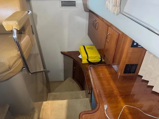 Slide: The Image of Interior of 2003 Carver 360 Sport Sedan with wooden cabinetry and stairs. - 30