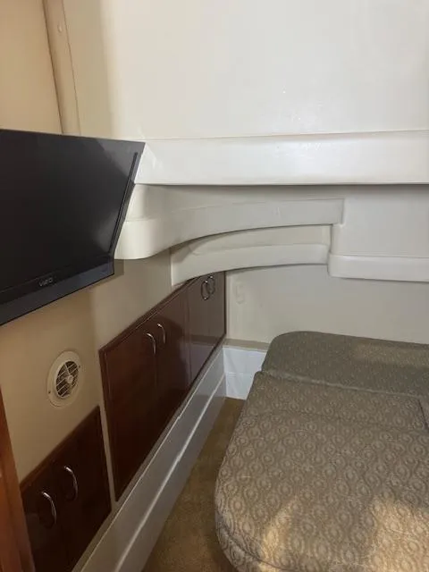 Slide: The Image of Interior cabin of 2003 Carver 360 Sport Sedan with TV and storage cabinets. - 31