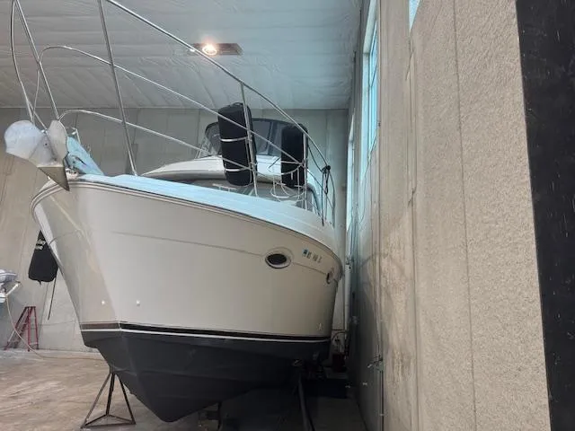 Slide: The Image of 2003 Carver 360 Sport Sedan yacht in indoor storage facility. - 4