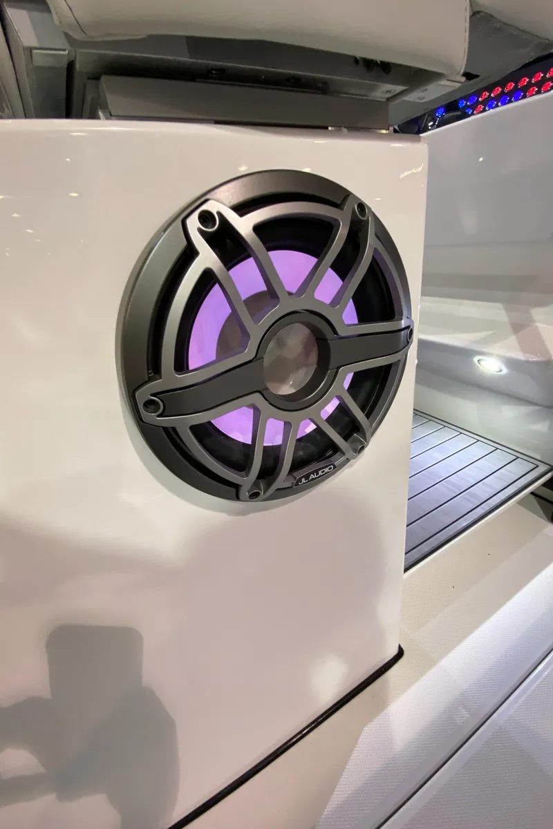 Slide: The Image of Speaker with purple LED light on 2025 Edgewater 340CC boat. - 38