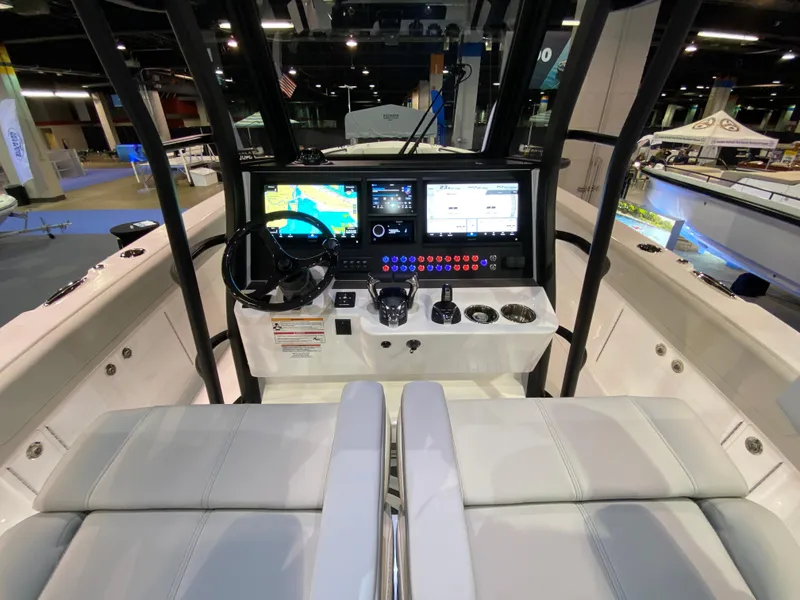 Slide: The Image of Edgewater 340CC 2025 boat cockpit with advanced navigation displays and controls. - 6