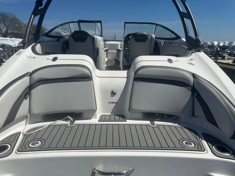 Slide: The Image of 2019 Yamaha Boats AR240 interior with seating and deck, showcasing modern design and comfort. - 12