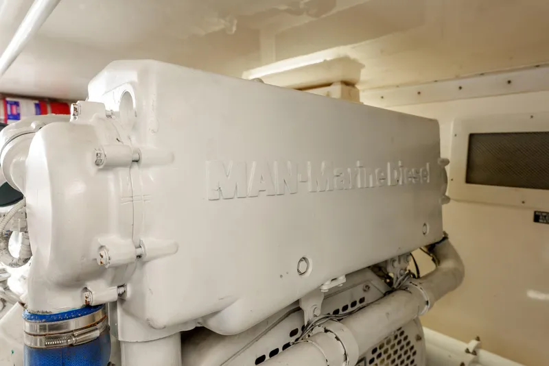 Slide: The Image of Engine room of 2004 Cabo 48 Flybridge with MAN marine diesel engine. - 32