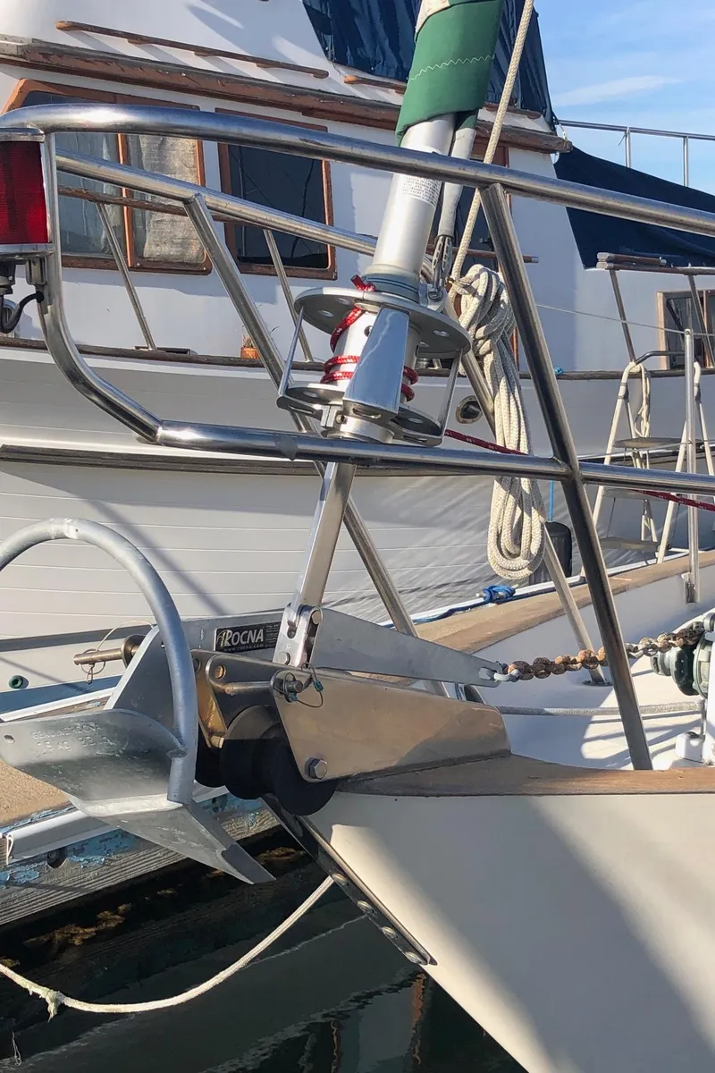 Slide: The Image of Bow of 1992 Pacific Seacraft 34 Crealock sailboat with anchor and railing. - 14