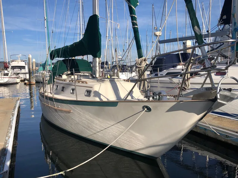 Slide: The Image of Sailboat docked in marina, 1992 Pacific Seacraft 34 Crealock model. - 17