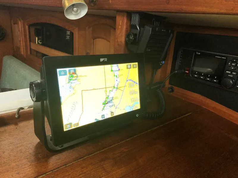 Slide: The Image of Navigation equipment on 1992 Pacific Seacraft 34 Crealock sailboat, featuring a digital display. - 5