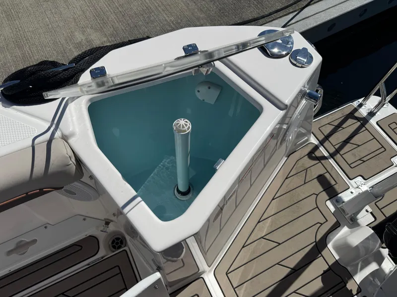 Slide: The Image of Livewell on 2025 Cutwater C-288 Coupe boat, open lid, deck view. - 4