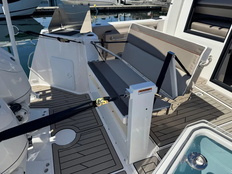 Slide: The Image of 2025 Cutwater C-288 Coupe boat interior with seating and deck details. - 9