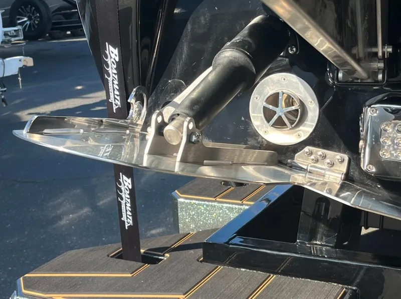 Slide: The Image of Rear view of 2025 Centurion Ri 265 boat with propeller and exhaust details. - 10