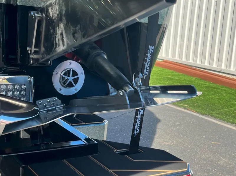 Slide: The Image of Close-up of 2025 Centurion Ri 265 boat's rear detailing and components. - 11