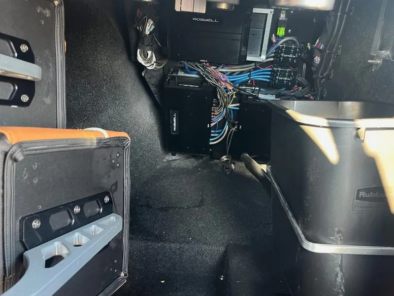 Slide: The Image of Interior view of 2025 Centurion Ri 265 showing wiring and storage compartments. - 33