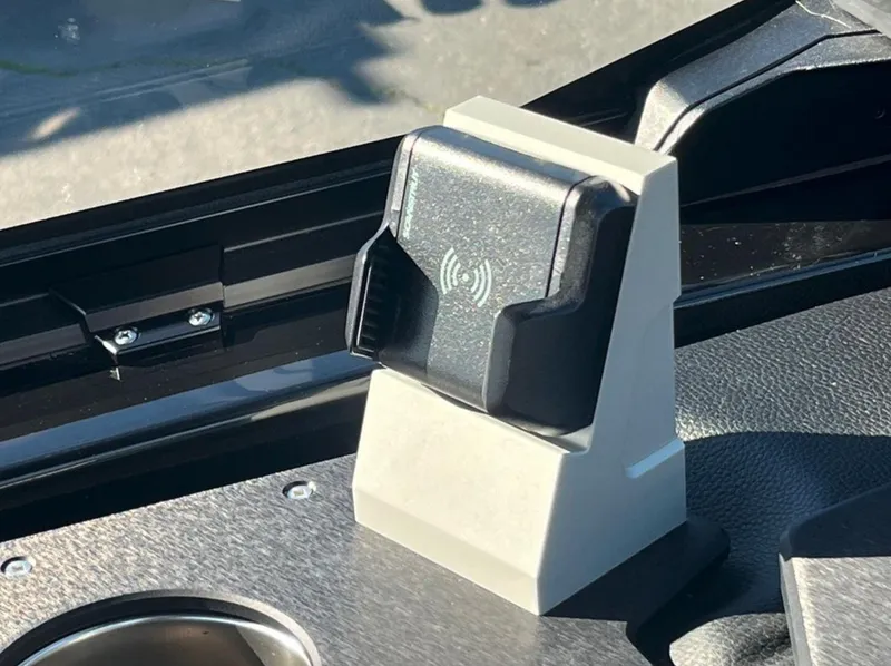 Slide: The Image of Wireless charging dock in 2025 Centurion Ri 265 boat dashboard. - 35
