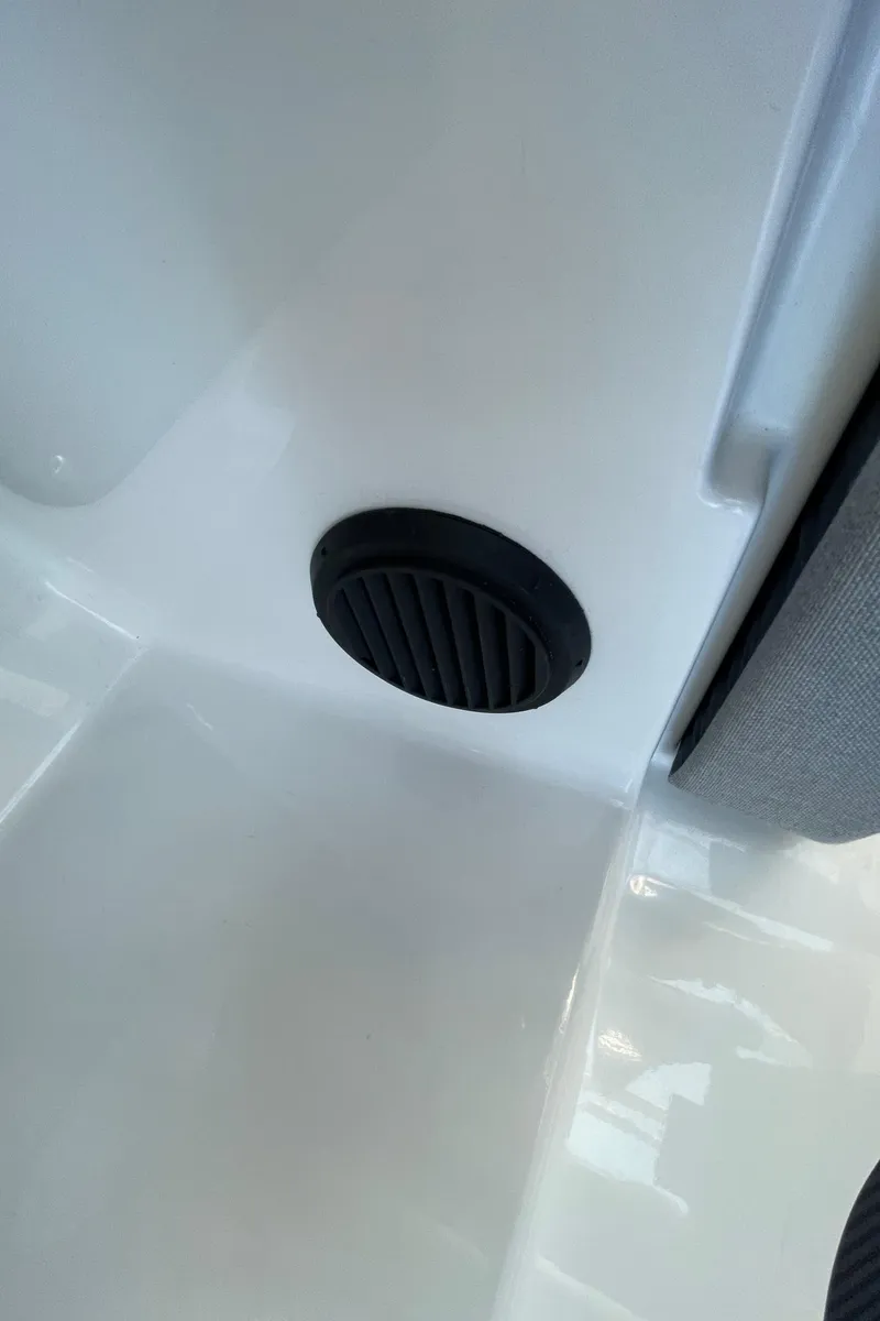 Slide: The Image of 2019 Jeanneau NC895 interior detail with black vent on white surface. - 31