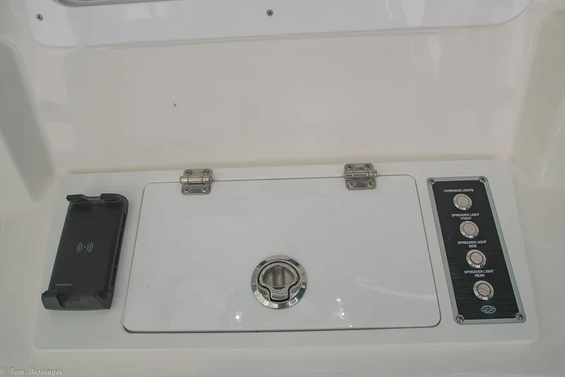 Slide: The Image of Control panel and storage compartment on 2021 Sea Fox 248 Commander boat. - 11