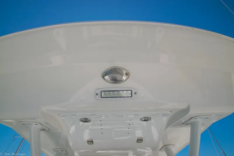 Slide: The Image of 2021 Sea Fox 248 Commander boat's underside view with speaker and light fixtures. - 16