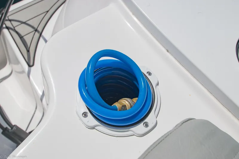 Slide: The Image of Blue coiled hose on 2021 Sea Fox 248 Commander boat deck. - 19
