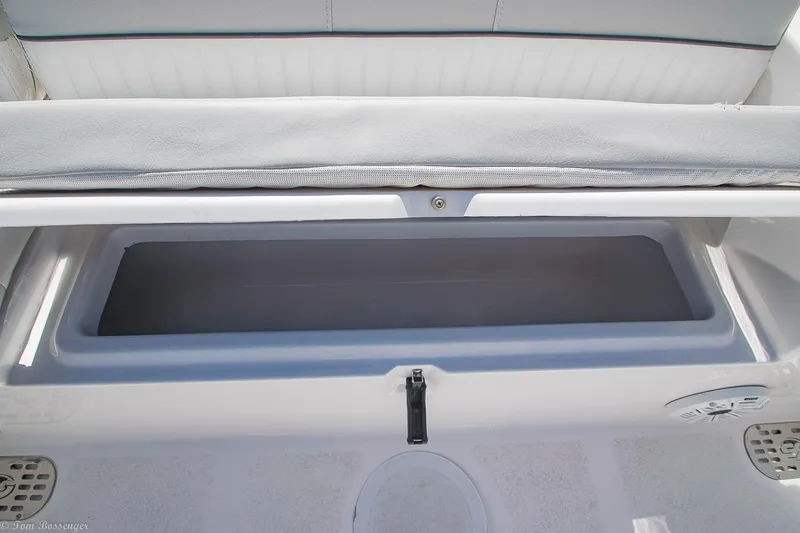 Slide: The Image of 2021 Sea Fox 248 Commander storage compartment, open and empty, showcasing interior space. - 21