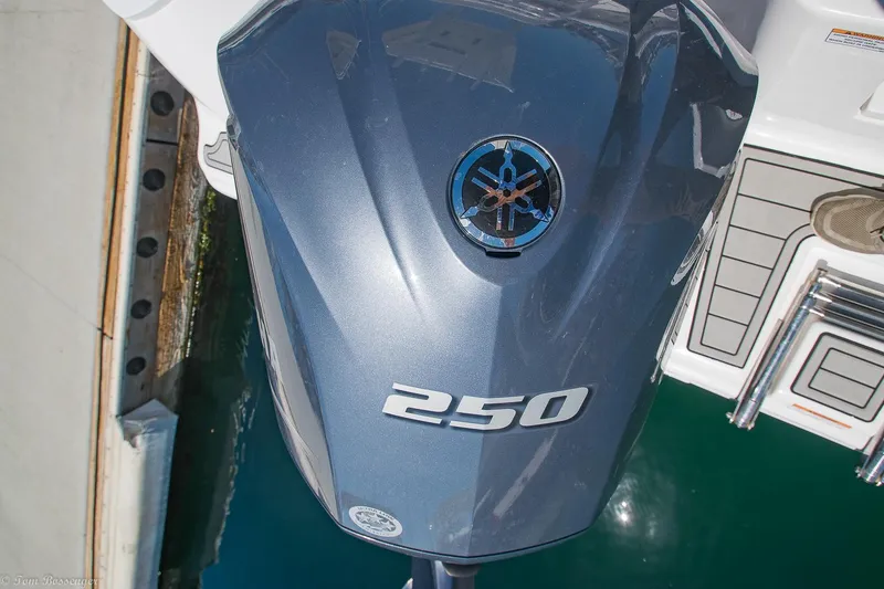 Slide: The Image of Outboard motor on 2021 Sea Fox 248 Commander boat, featuring a 250 horsepower engine. - 24