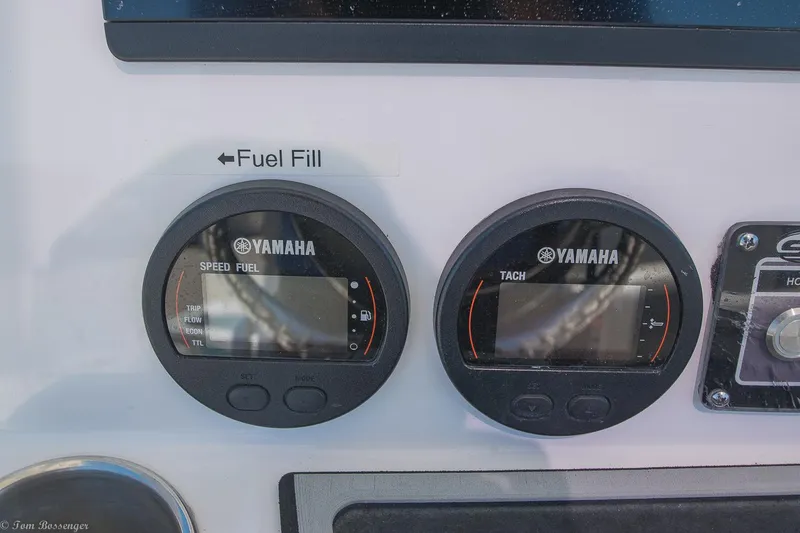 Slide: The Image of Yamaha gauges on 2021 Sea Fox 248 Commander boat dashboard, showing speed, fuel, and tachometer. - 8