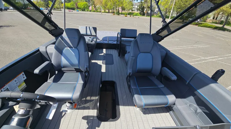 Slide: The Image of 2025 Manitou 24' Explore MAX Deck Navigator with 150hp Rotax Stealth Motor, interior view. - 37