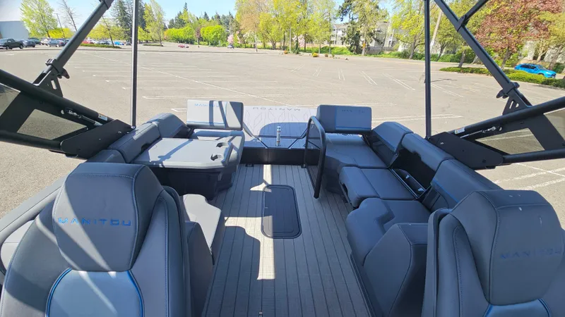 Slide: The Image of 2025 Manitou 24' Explore MAX Deck Navigator with 150hp Rotax Stealth Motor, spacious seating. - 41