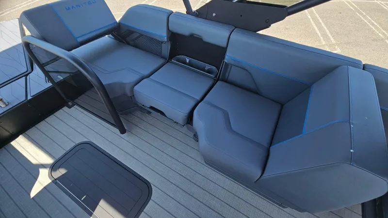 Slide: The Image of 2025 Manitou 24' Explore MAX Deck Navigator interior with sleek seating and modern design. - 42