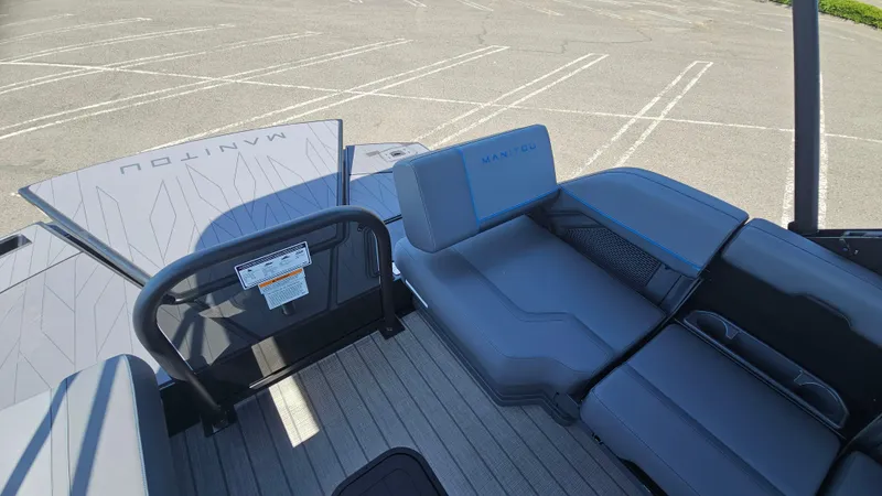 Slide: The Image of 2025 Manitou 24' Explore MAX Deck Navigator with 150hp Rotax Stealth Motor, spacious seating. - 45