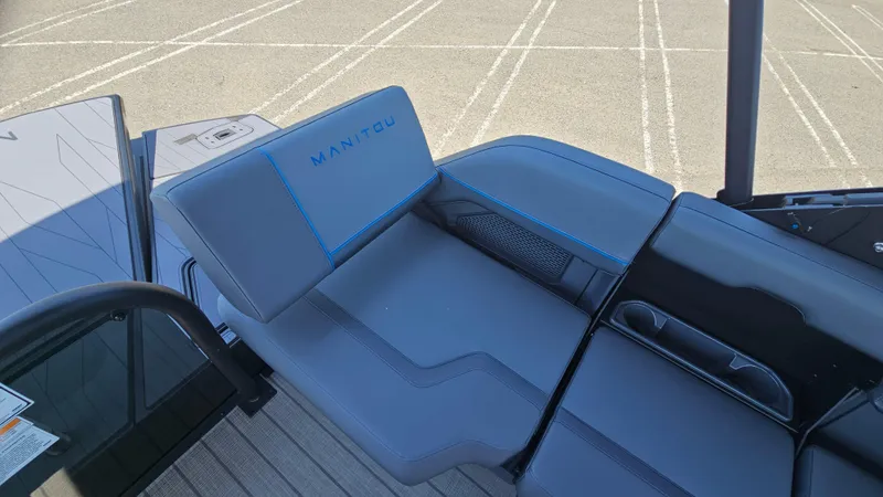 Slide: The Image of 2025 Manitou 24' Explore MAX Deck Navigator with sleek seating and 150hp Rotax Stealth Motor. - 46