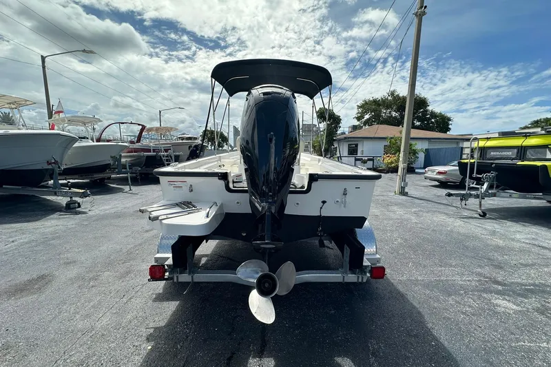 Slide: The Image of 2022 Boston Whaler 170 Montauk boat on trailer, rear view, outdoor display. - 4