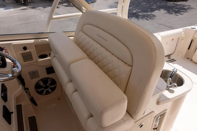 Slide: The Image of Luxurious seating on 2018 Grady-White Freedom 335 boat, featuring elegant design and premium materials. - 16