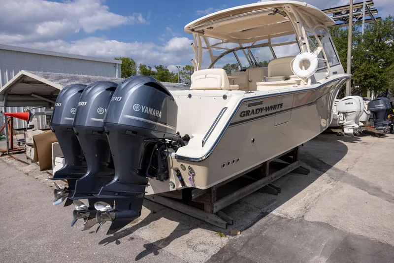 Slide: The Image of 2018 Grady-White Freedom 335 boat with Yamaha outboard motors on display. - 3