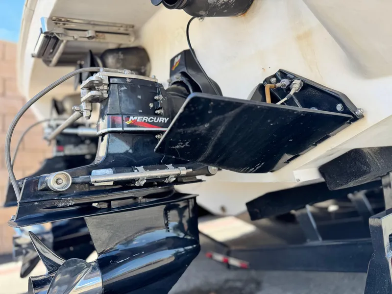 Slide: The Image of 2004 Donzi 38 ZX boat with Mercury outboard motor, close-up view. - 10