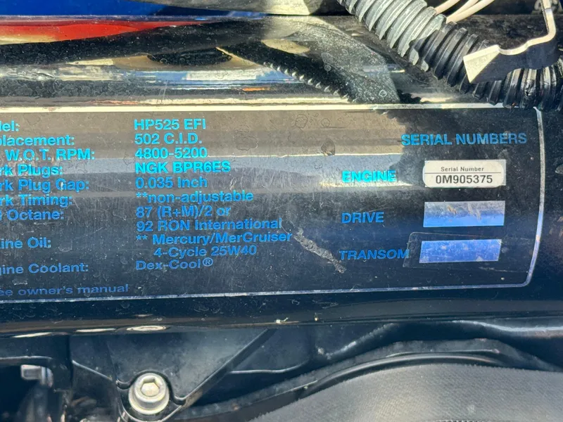 Slide: The Image of 2004 Donzi 38 ZX engine specifications label with serial number and technical details. - 17