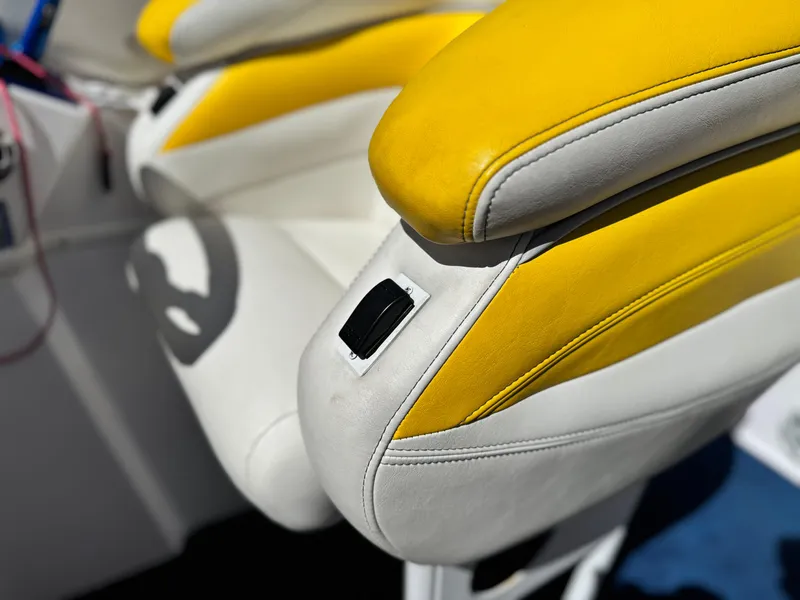 Slide: The Image of Yellow and white seat detail of a 2004 Donzi 38 ZX boat. - 30