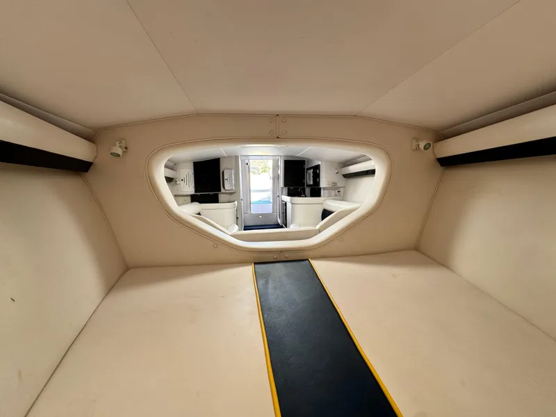 Slide: The Image of Interior cabin of a 2004 Donzi 38 ZX boat, featuring sleek design and modern amenities. - 49