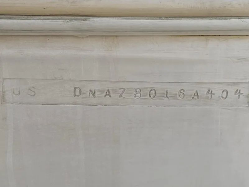 Slide: The Image of Hull identification number on a 2004 Donzi 38 ZX boat. - 58