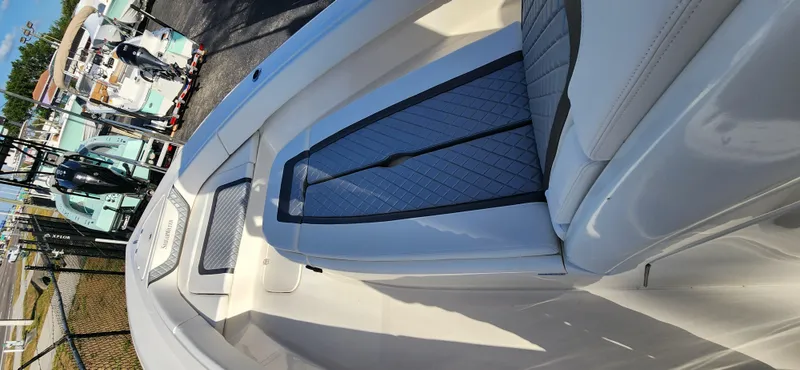 Slide: The Image of 2025 ShearWater 270 SS Open Carolina boat interior with sleek seating and modern design. - 23