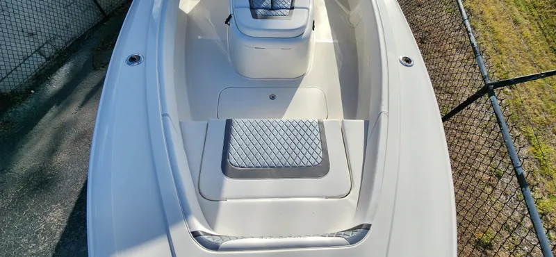 Slide: The Image of 2025 ShearWater 270 SS Open Carolina boat deck, featuring sleek design and seating area. - 25