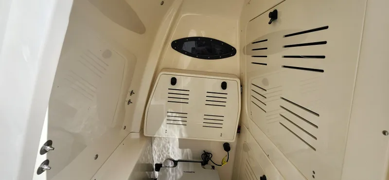 Slide: The Image of Interior view of 2025 ShearWater 270 SS Open Carolina boat cabin. - 28