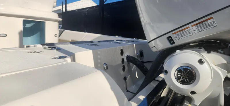 Slide: The Image of 2025 ShearWater 270 SS Open Carolina boat interior with engine details. - 4